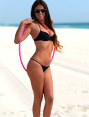 Claudia-Romani-in-Bikini-at-the-beach-in-Miami-with-a-hula-hoop-6