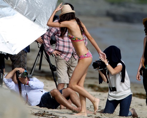 **EXCLUSIVE** Kendall Jenner hits the beach to model colorful bikinis for Agua Bendita Swim Boutique