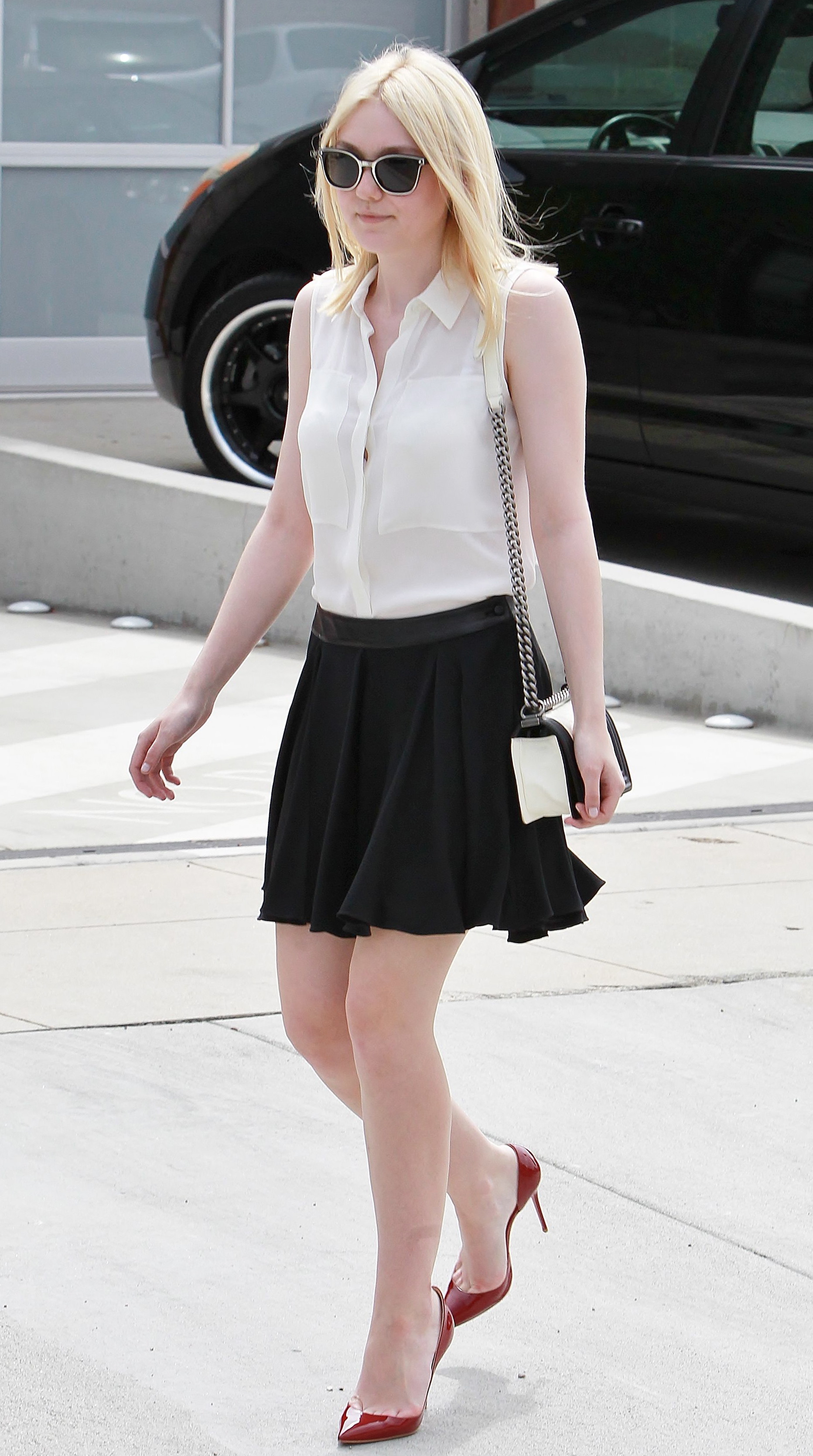 Dakota-Fanning-in-Short-Skirt-and-High-Heels-in-NYC-14