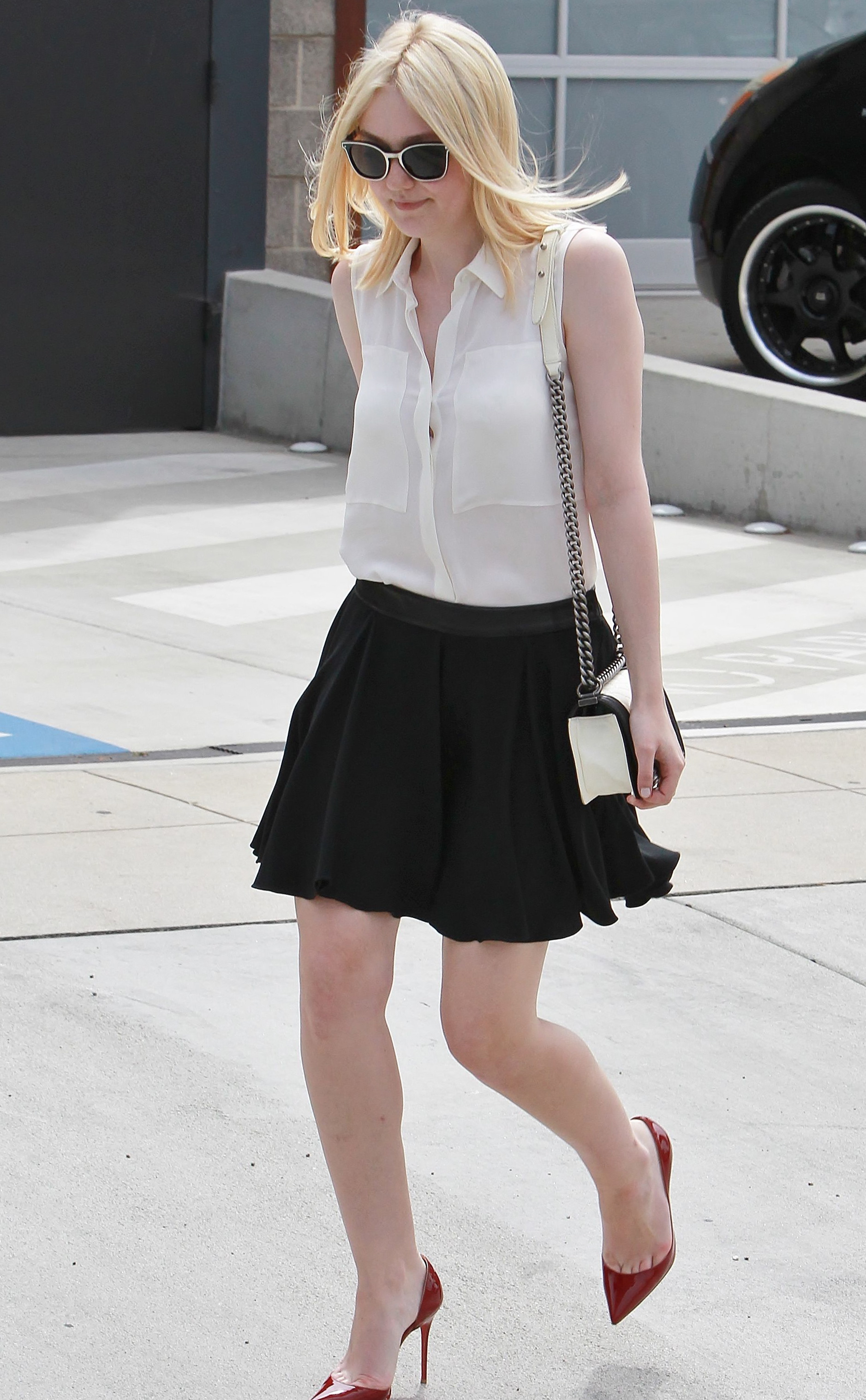 Dakota-Fanning-in-Short-Skirt-and-High-Heels-in-NYC-4