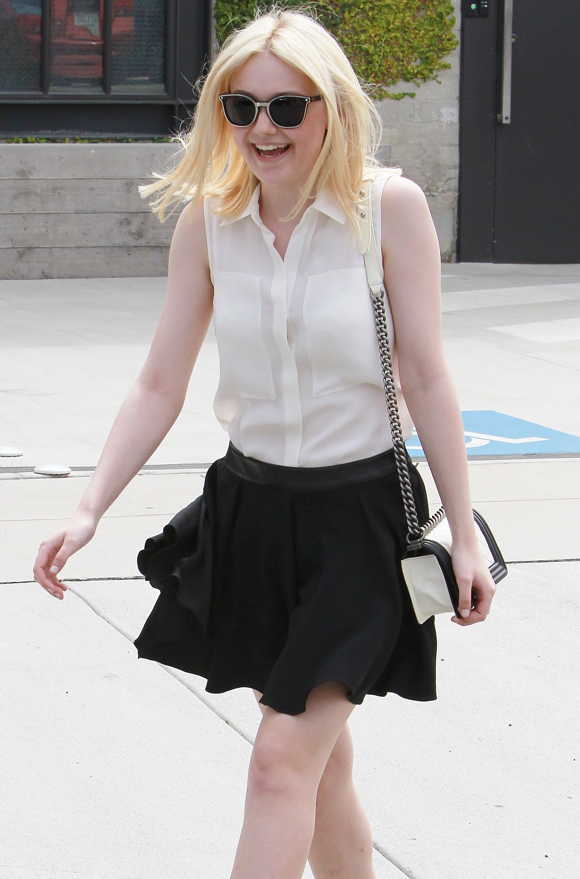 Dakota-Fanning-in-Short-Skirt-and-High-Heels-in-NYC-5