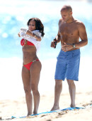 EXCLUSIVE: Mel B pops some champagne on the beach in a bright red birthday bikini in Malibu, CA - Part 1