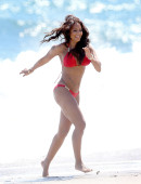 EXCLUSIVE: Mel B pops some champagne on the beach in a bright red birthday bikini in Malibu, CA - Part 1