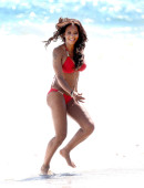 EXCLUSIVE: Mel B pops some champagne on the beach in a bright red birthday bikini in Malibu, CA - Part 1