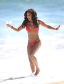 EXCLUSIVE: Mel B pops some champagne on the beach in a bright red birthday bikini in Malibu, CA - Part 1