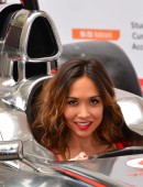 Formula 1 star Jenson Button is joined by TV personality Myleene Klass to pose for pictures with a McClaren car to promote the car manufacturer's sponsor Santander in London