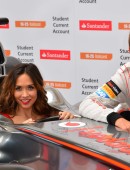 Formula 1 star Jenson Button is joined by TV personality Myleene Klass to pose for pictures with a McClaren car to promote the car manufacturer's sponsor Santander in London