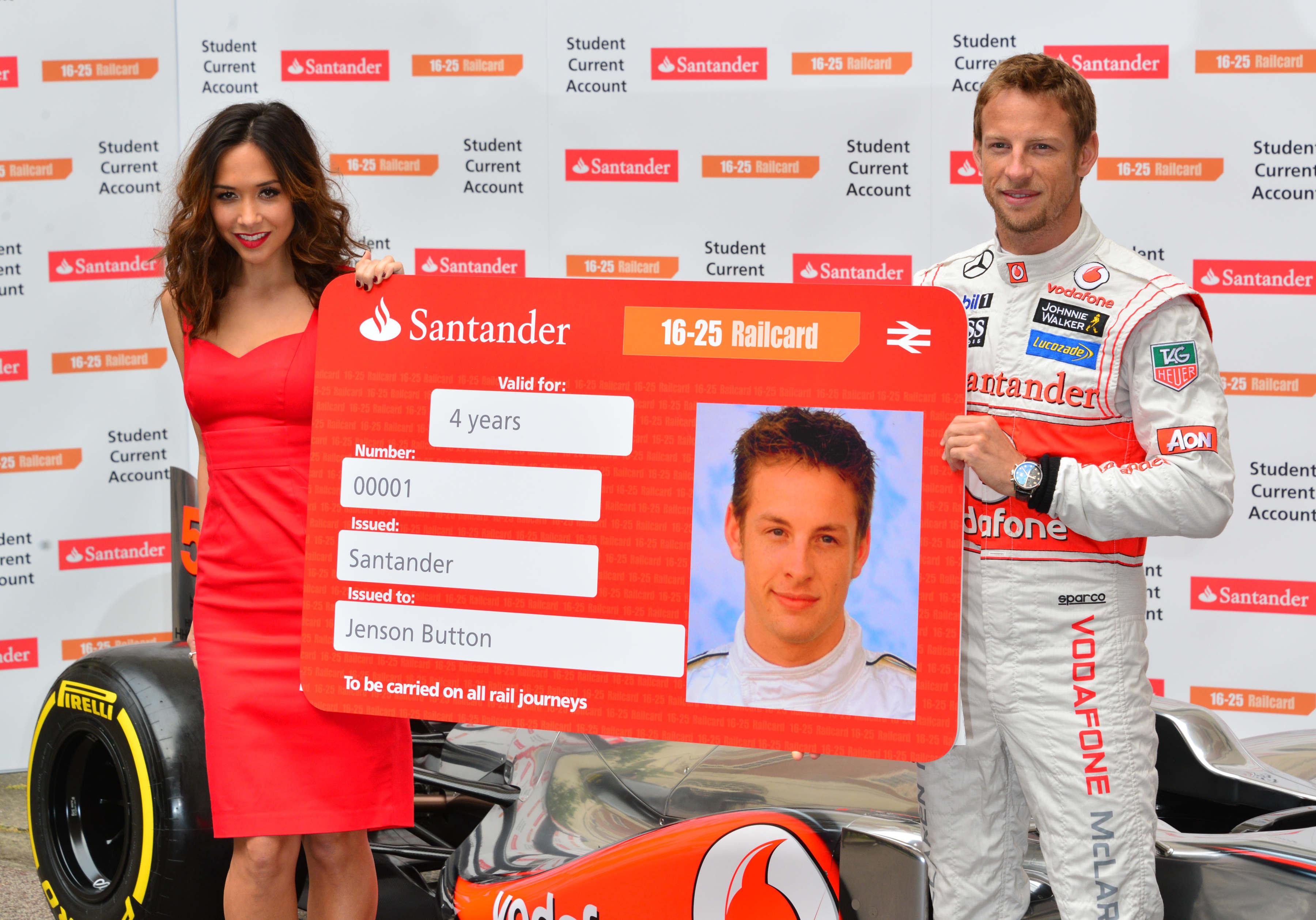 Formula 1 star Jenson Button is joined by TV personality Myleene Klass to pose for pictures with a McClaren car to promote the car manufacturer's sponsor Santander in London