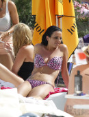 Natalee-Harris-in-Bikini-Lounging-by-the-Pool-in-Ibiza-13