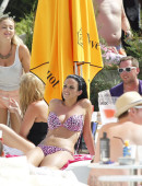 Natalee-Harris-in-Bikini-Lounging-by-the-Pool-in-Ibiza-7