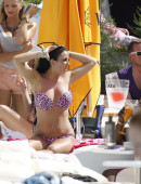 Natalee-Harris-in-Bikini-Lounging-by-the-Pool-in-Ibiza-9