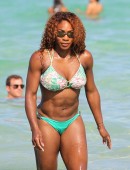 Serena Williams in a green floral print bikini at the beach in Miami