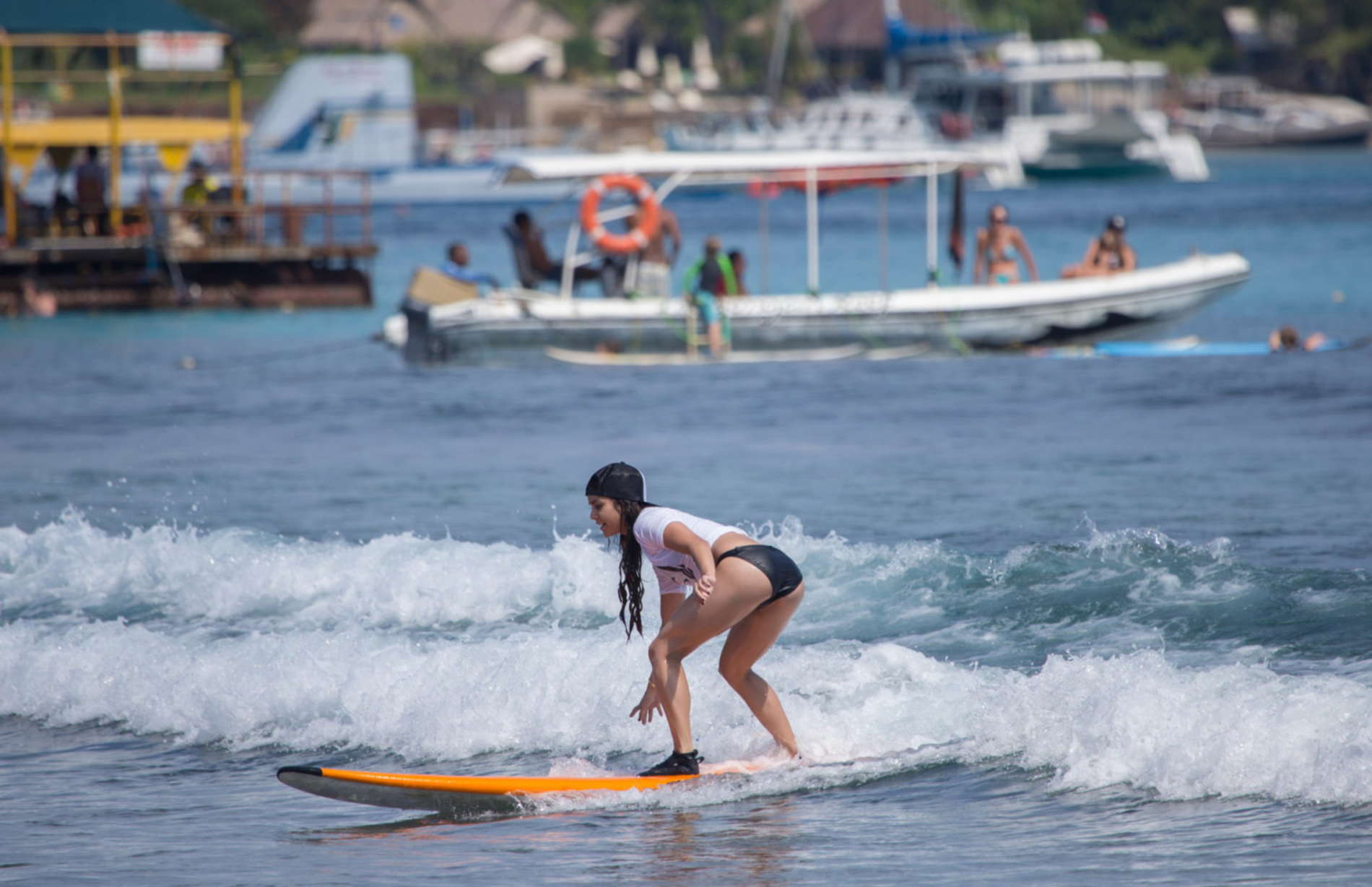 Vanessa-Hudgens-and-Ashley-Greene-in-Bikini-at-Oakley-Bali-in-Benoa-15