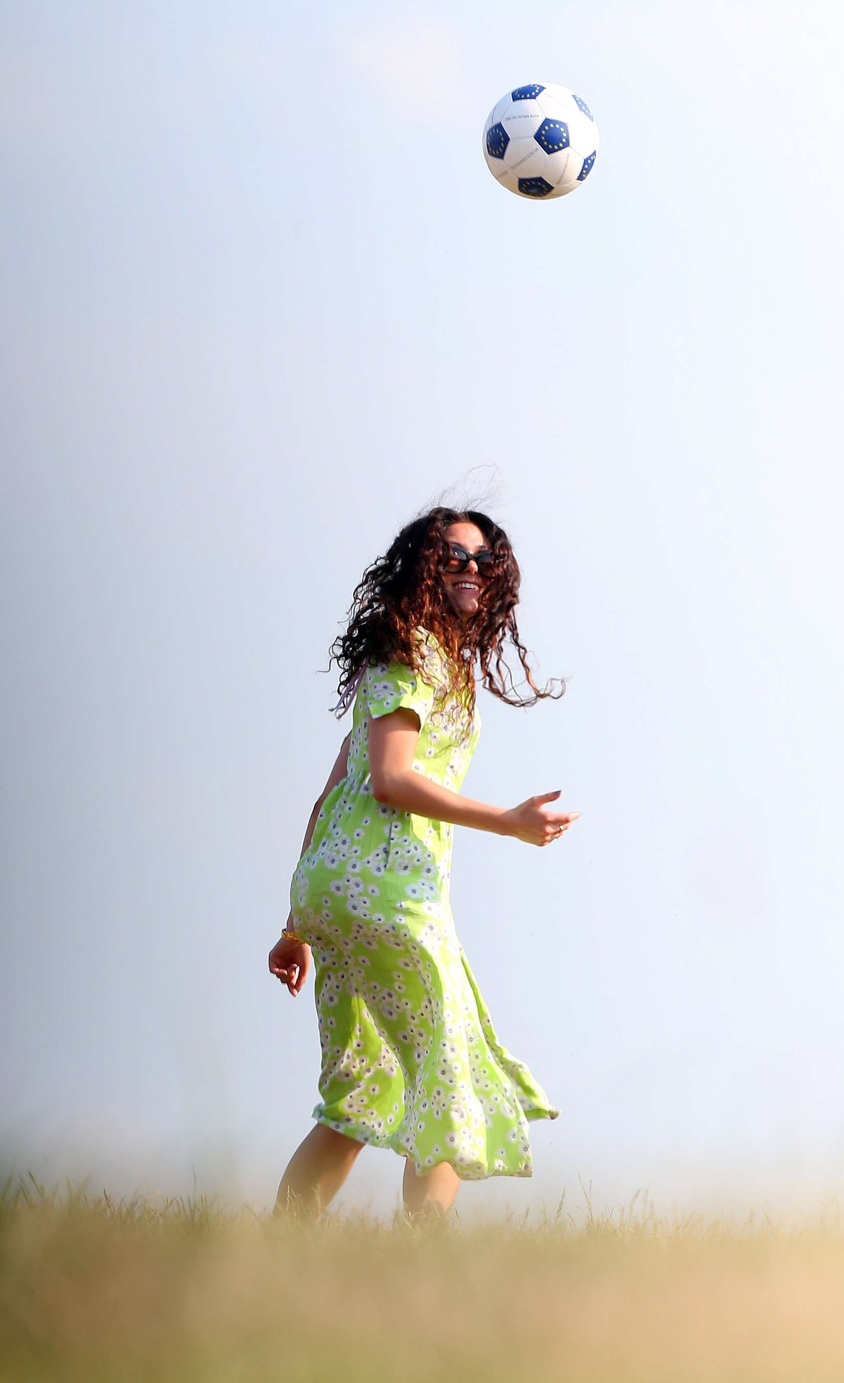 Eliza-Doolittle-Kicking-Ball-in-Green-Dress-in-London-1