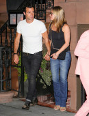 Jennifer Aniston and Justin Theroux show some PDA as they leave dinner in NYC