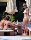 Rita-Ora-in-Bikini-at-a-Pool-in-Ibiza-14