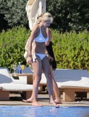 Rita-Ora-in-Bikini-at-a-Pool-in-Ibiza-9