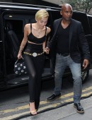 Miley Cyrus arriving at an office building