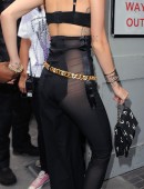 Miley Cyrus arriving at an office building