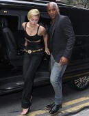 Miley Cyrus arriving at an office building