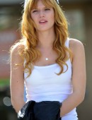 EXCLUSIVE: Actress Bella Thorne looking fashionable in a beanie, white t-shirt and jeans as she waits for some friends while out and about in Studio City, CA