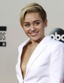 Singer Miley Cyrus arrives at the 41st American Music Awards in Los Angeles