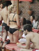EXCLUSIVE: Margot Robbie films romantic pool-side scene with hunky Brazilian co-star Rodrigo Santoro