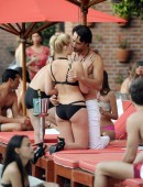 EXCLUSIVE: Margot Robbie films romantic pool-side scene with hunky Brazilian co-star Rodrigo Santoro