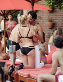 EXCLUSIVE: Margot Robbie films romantic pool-side scene with hunky Brazilian co-star Rodrigo Santoro