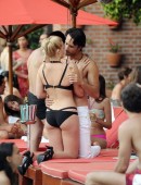 EXCLUSIVE: Margot Robbie films romantic pool-side scene with hunky Brazilian co-star Rodrigo Santoro