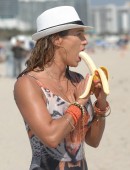 International fitness model Jennifer Nicole Lee hits the beach in a sexy one piece tiger swimsuit and shows off her inner tiger spirit at Miami Beach