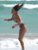 International fitness model Jennifer Nicole Lee hits the beach in a sexy one piece tiger swimsuit and shows off her inner tiger spirit at Miami Beach