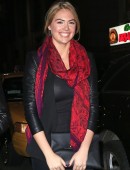 Kate Upton takes an unidentified male date to the New York Knicks vs Miami Heat basketball game at Madison Square Garden