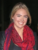 Kate Upton takes an unidentified male date to the New York Knicks vs Miami Heat basketball game at Madison Square Garden