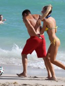 Laura Cremaschi and boyfriend Andrea Perone playing soccer on the beach in Miami