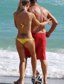 Laura Cremaschi and boyfriend Andrea Perone playing soccer on the beach in Miami