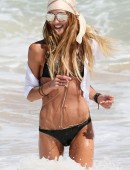 Sharni Vinson takes Willow Ann, a friends toddler, to the beach at Cronulla