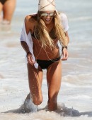 Sharni Vinson takes Willow Ann, a friends toddler, to the beach at Cronulla