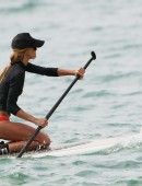 Sharni Vinson and family seen paddle boarding and having fun in water at Cronulla Beach in Sydney
