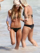Sharni Vinson takes Willow Ann, a friends toddler, to the beach at Cronulla
