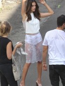 Alessandra Ambrosio wears a high-slit white dress with sequined palm trees for a Harpers Bazaar photo shoot in Los Angeles