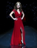 Giada De Laurentiis  presents a creation by Carolina Herrera for the The Heart Truth Fall 2014 collection during New York Fashion Week