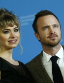 Cast members Imogen Poots and Aaron Paul pose during photocall to promote the movie "A Long Way Down" at Berlinale International Film Festival in Berlin