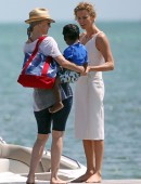 Charlize Theron gets a visit from son Jackson while on a photo shoot in Miami Beach