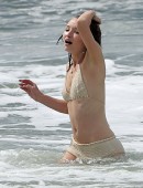 Emily Browning films a beach scene for "The Shangri-La Suite" in Los Angeles