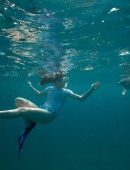 Miranda-Cosgrove-Oceana-Swimming-with-Dolphins-Campaign-4