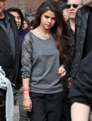Selena Gomez has a large group of bodyguards surround her while she does a photoshoot at the 'Highline' in the Meatpacking District