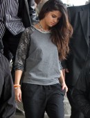 Selena Gomez has a large group of bodyguards surround her while she does a photoshoot at the 'Highline' in the Meatpacking District