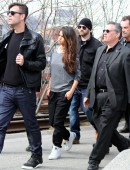 Selena Gomez has a large group of bodyguards surround her while she does a photoshoot at the 'Highline' in the Meatpacking District