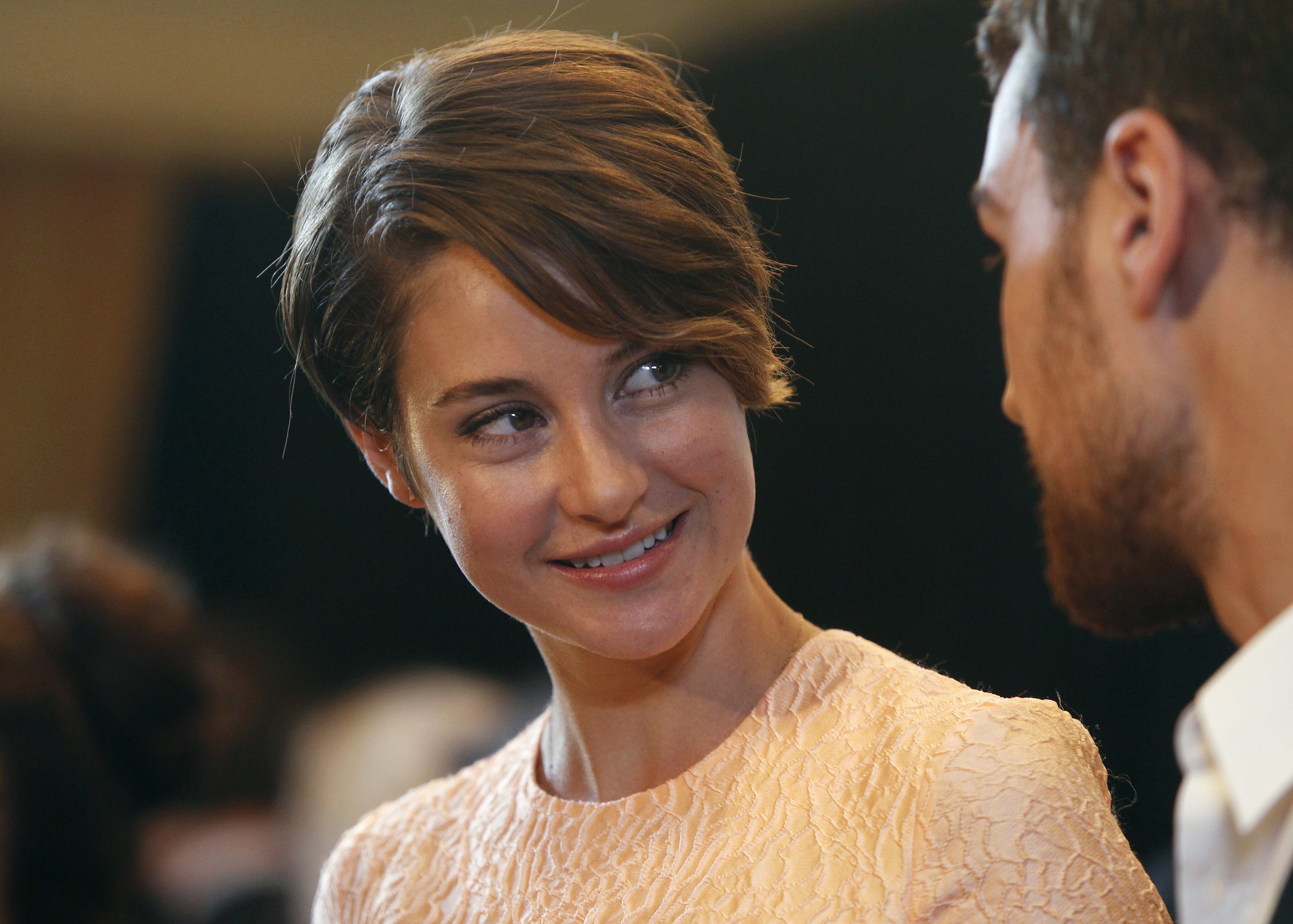 Cast members Theo James and Shailene Woodley of the new film "Divergent" are interviewed at the 51st annual Publicists Guild Awards in Beverly Hills, California